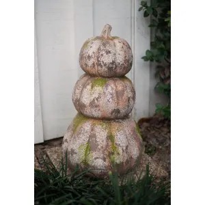 three stacked faux concrete pumpkins 1