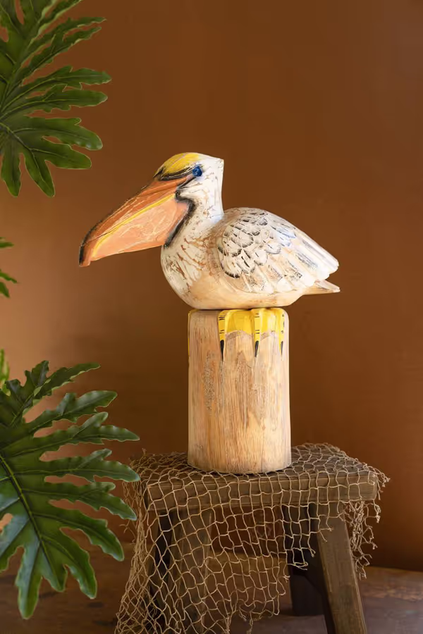 Carved Wood Pelican On A Piling