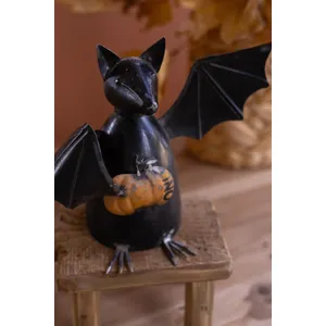 Recycled Metal Bat Holding a Pumpkin 3