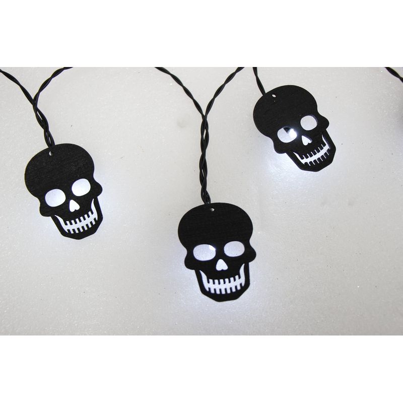 B/O 10 BLK SKULLS W/LED LIGHTS