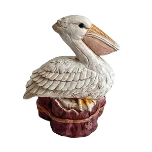 16-1/4" PELICAN ON STUMP 1