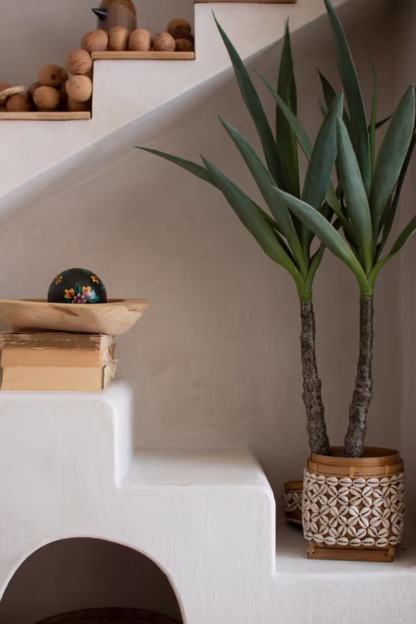 Textured Arched Shelving Unit with Stairs Detail