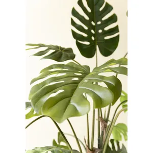 Artificial Monstera Plant in a Black Plastic Pot 4