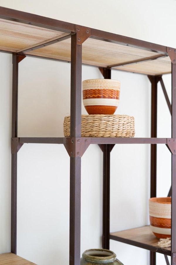 Iron and Wood Display with Alternating Shelves and Iron Casters