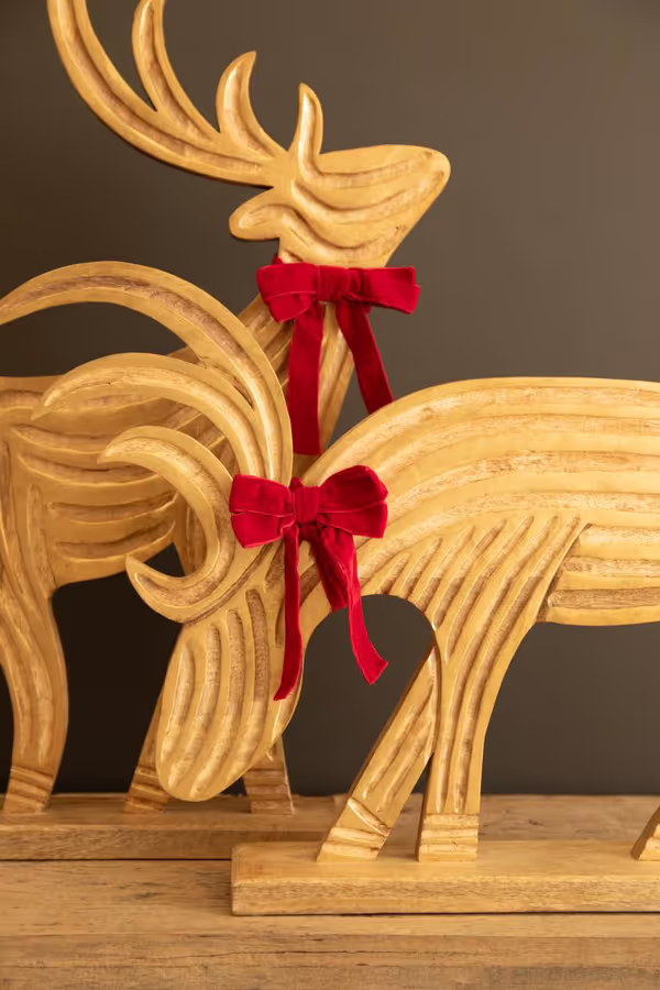 Set of 2 Carved Mango Wood Reindeer with Red Velvet Ribbon and Painted Gold Detail