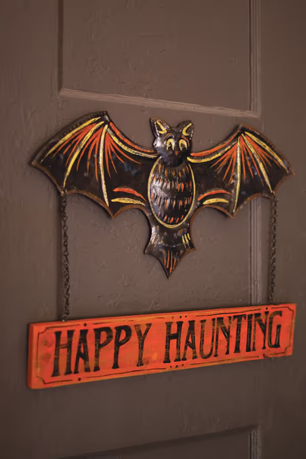 Hand-Hammered Painted Metal Bat with Happy Haunting Sign Wall Hanging
