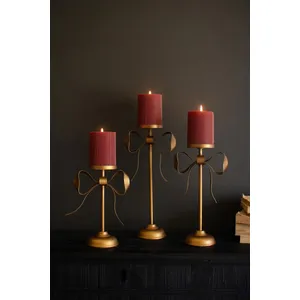 Set of 3 Antique Brass Pillar Candle Stands with Bow Detail 1