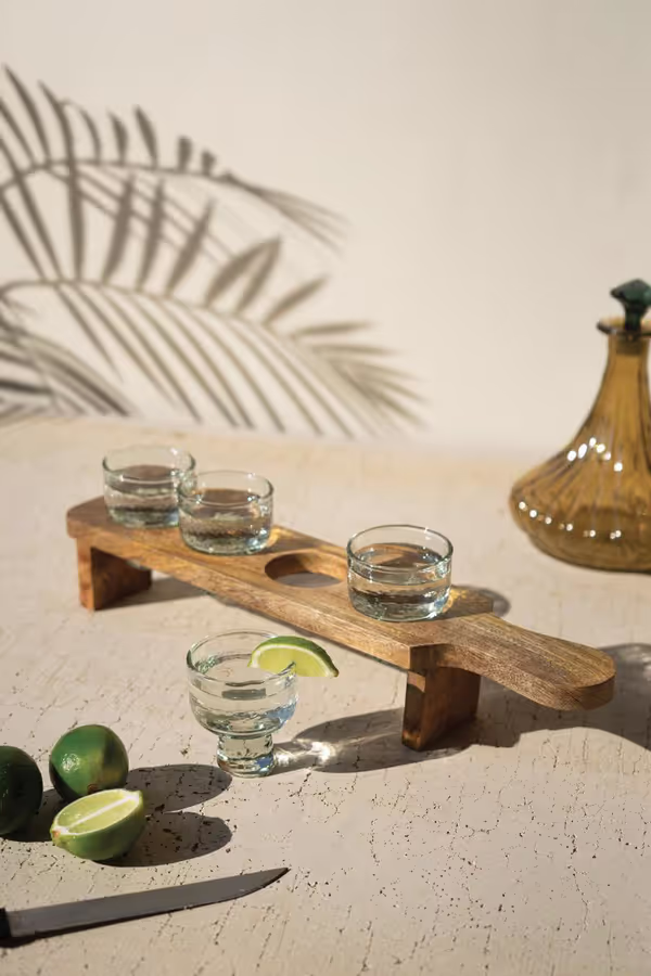 Tequila Flight with Four Glasses on a Wooden Tray